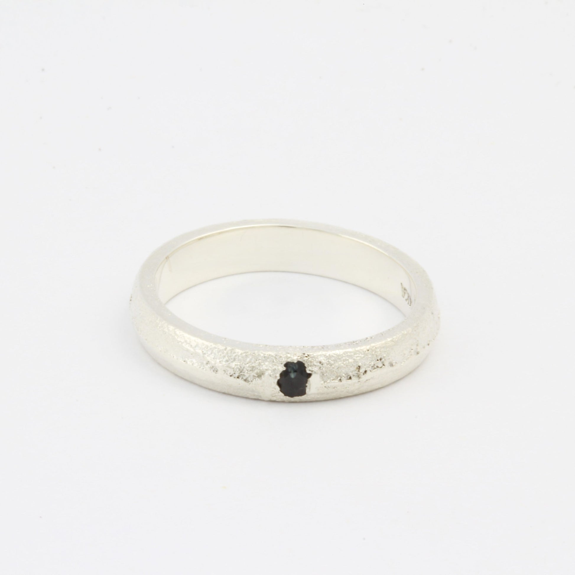 silver ring with blue sapphire frontside