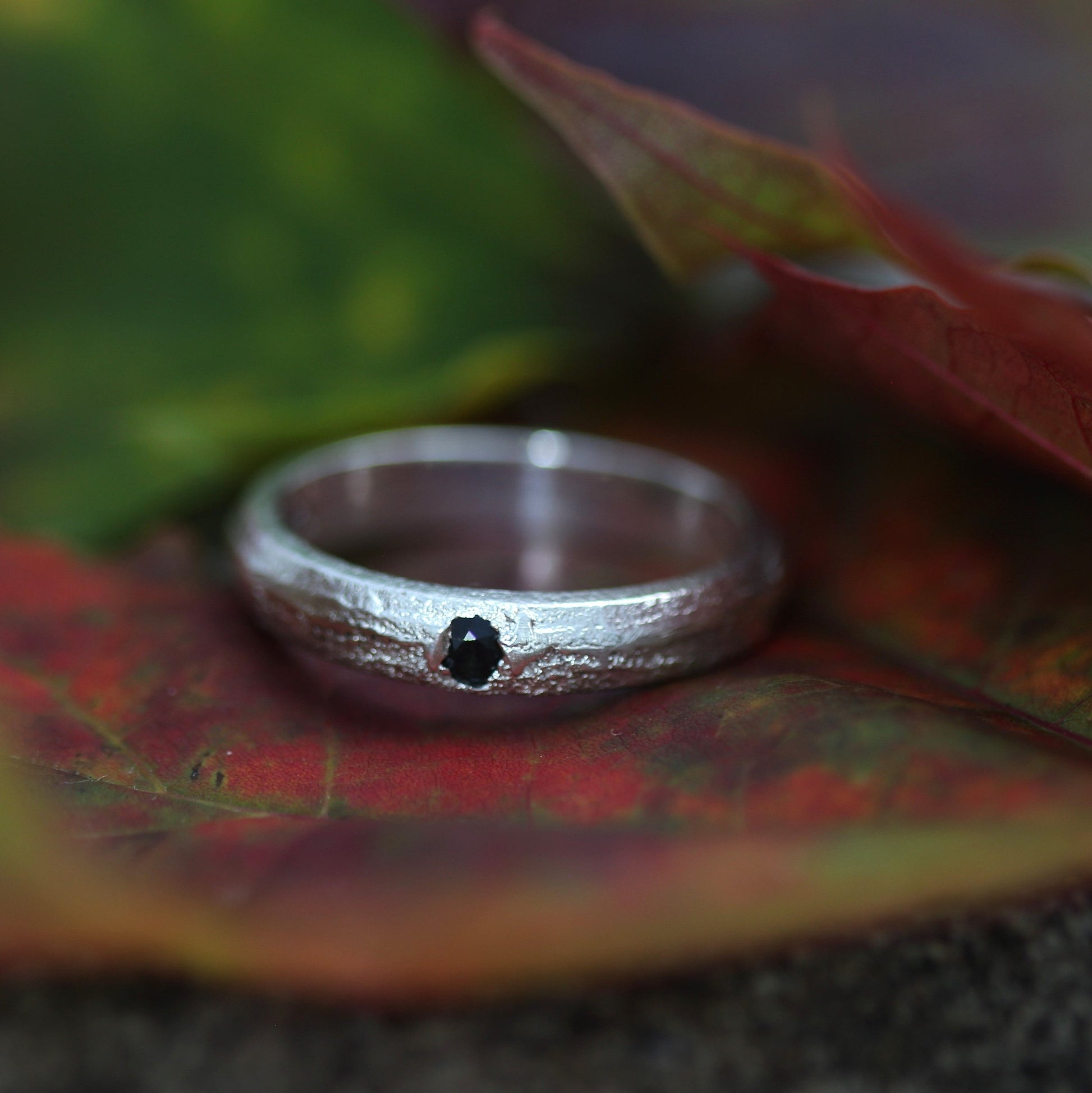 silver ring with blue sapphire front