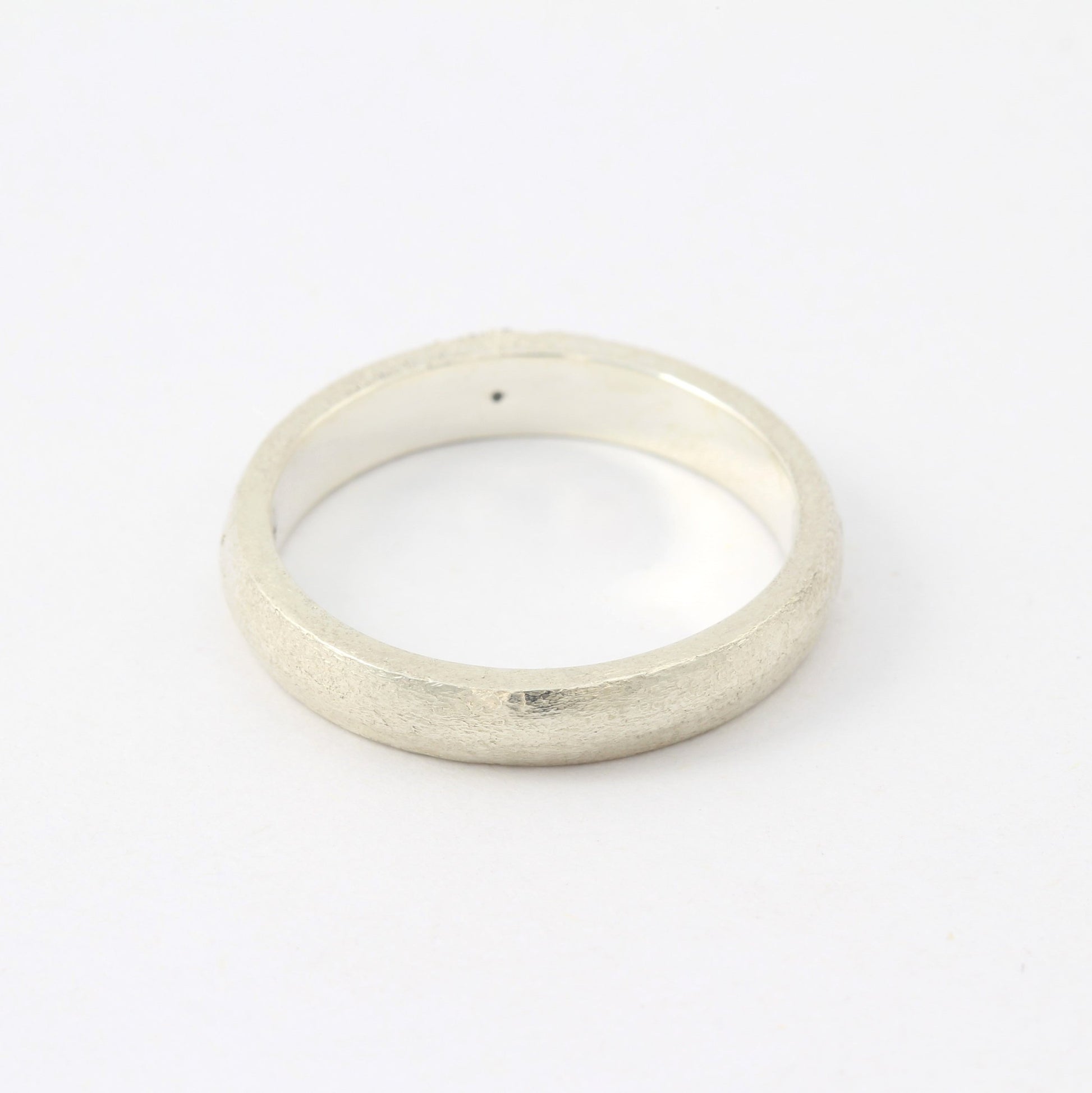 silver ring with blue sapphire back