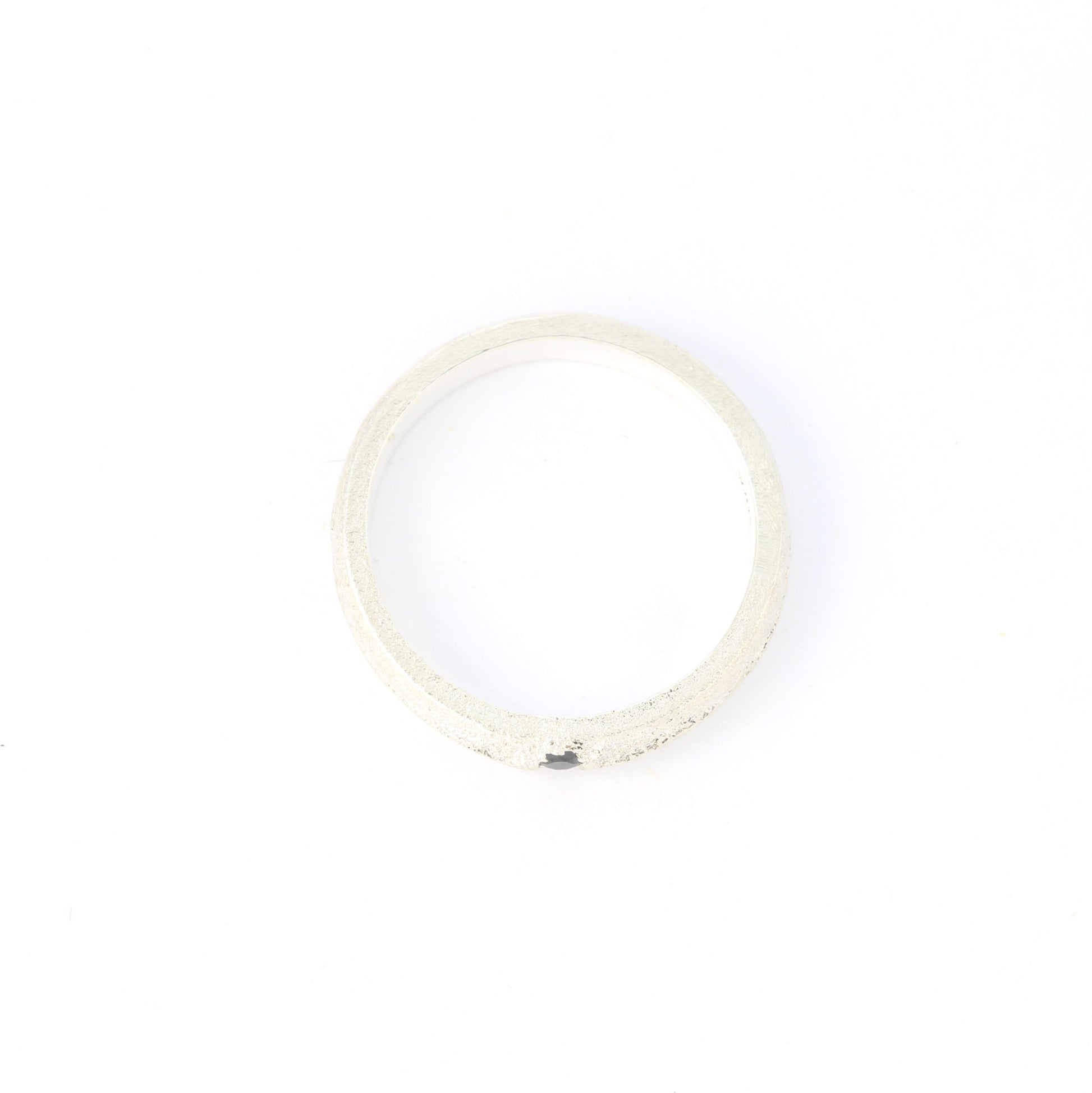 silver ring with blue sapphire up
