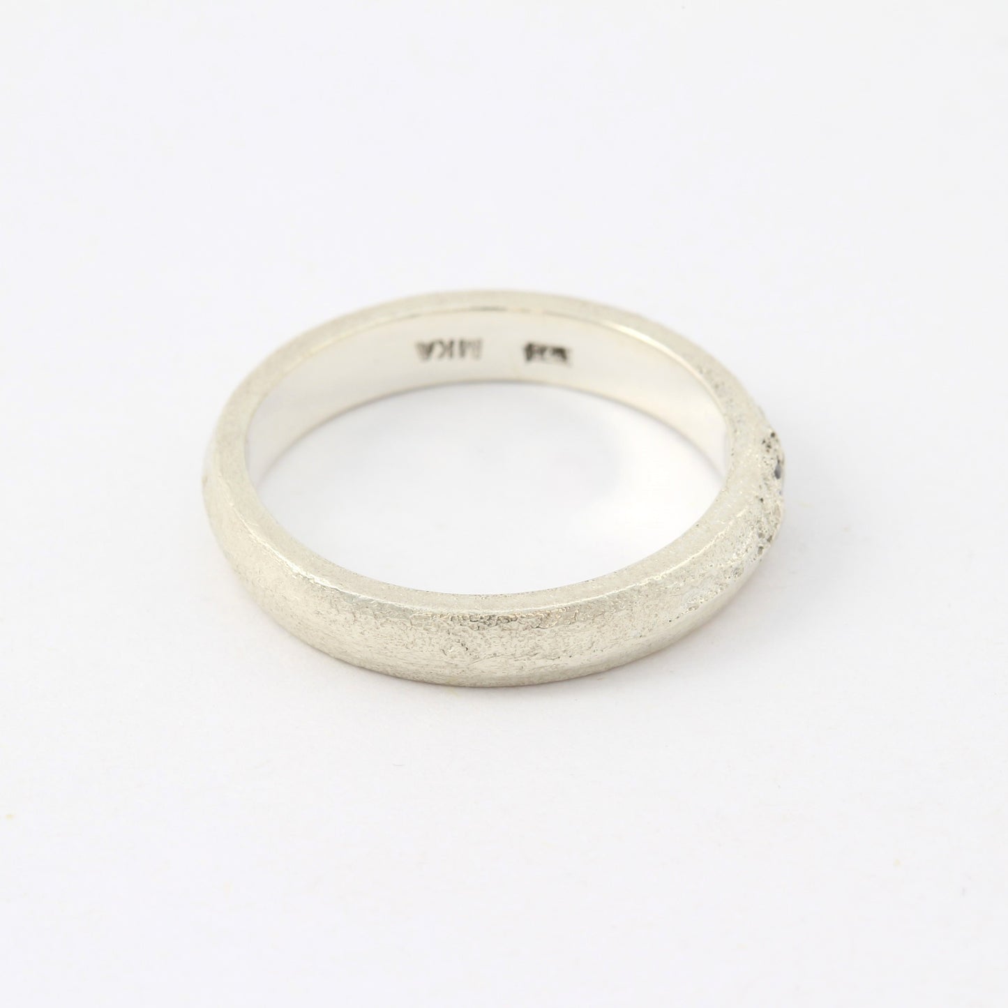 silver ring with blue sapphire right