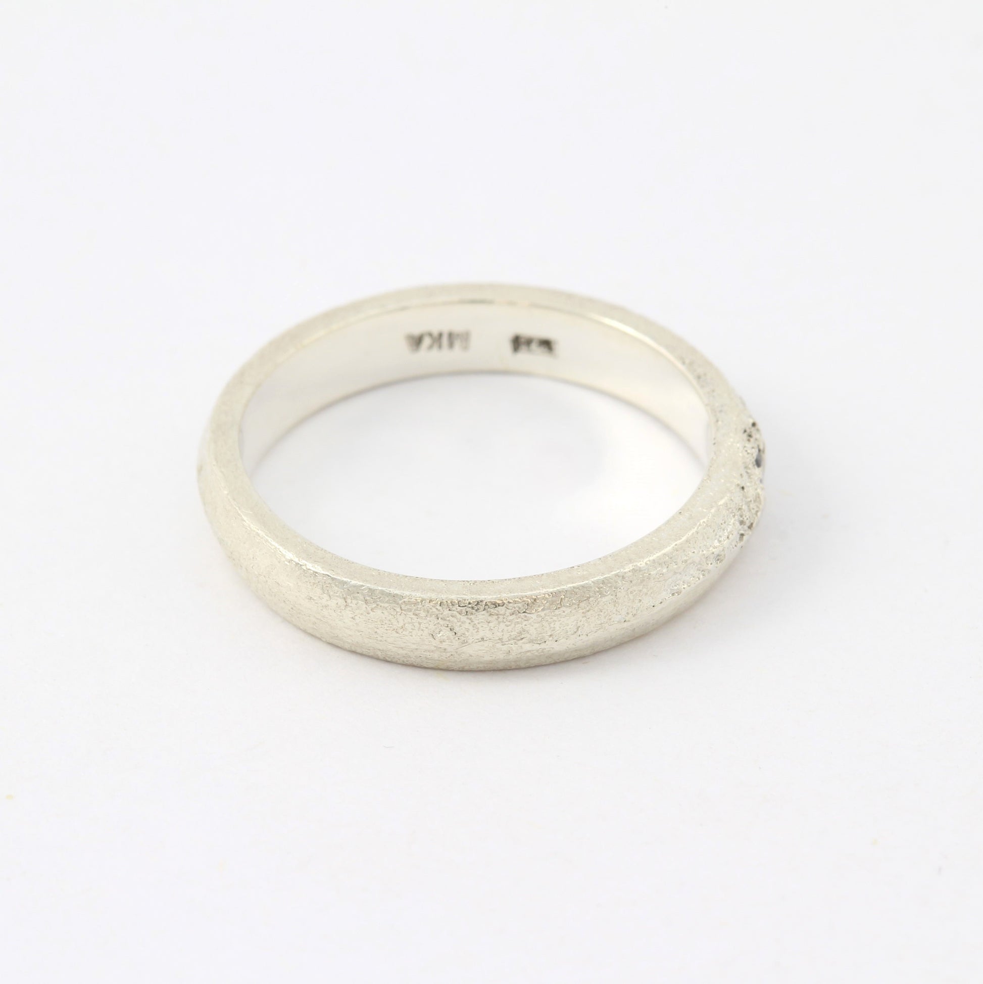 silver ring with blue sapphire right