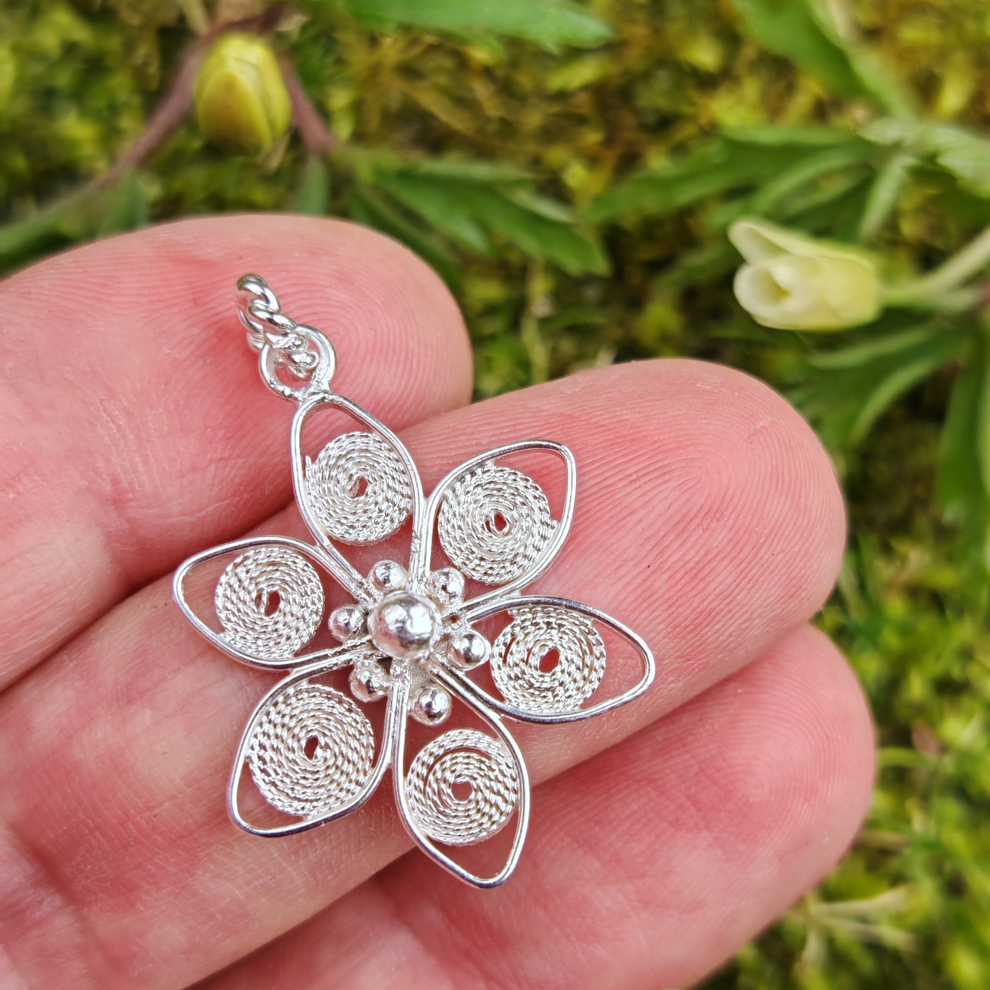 holding anemone nemorosa pendant