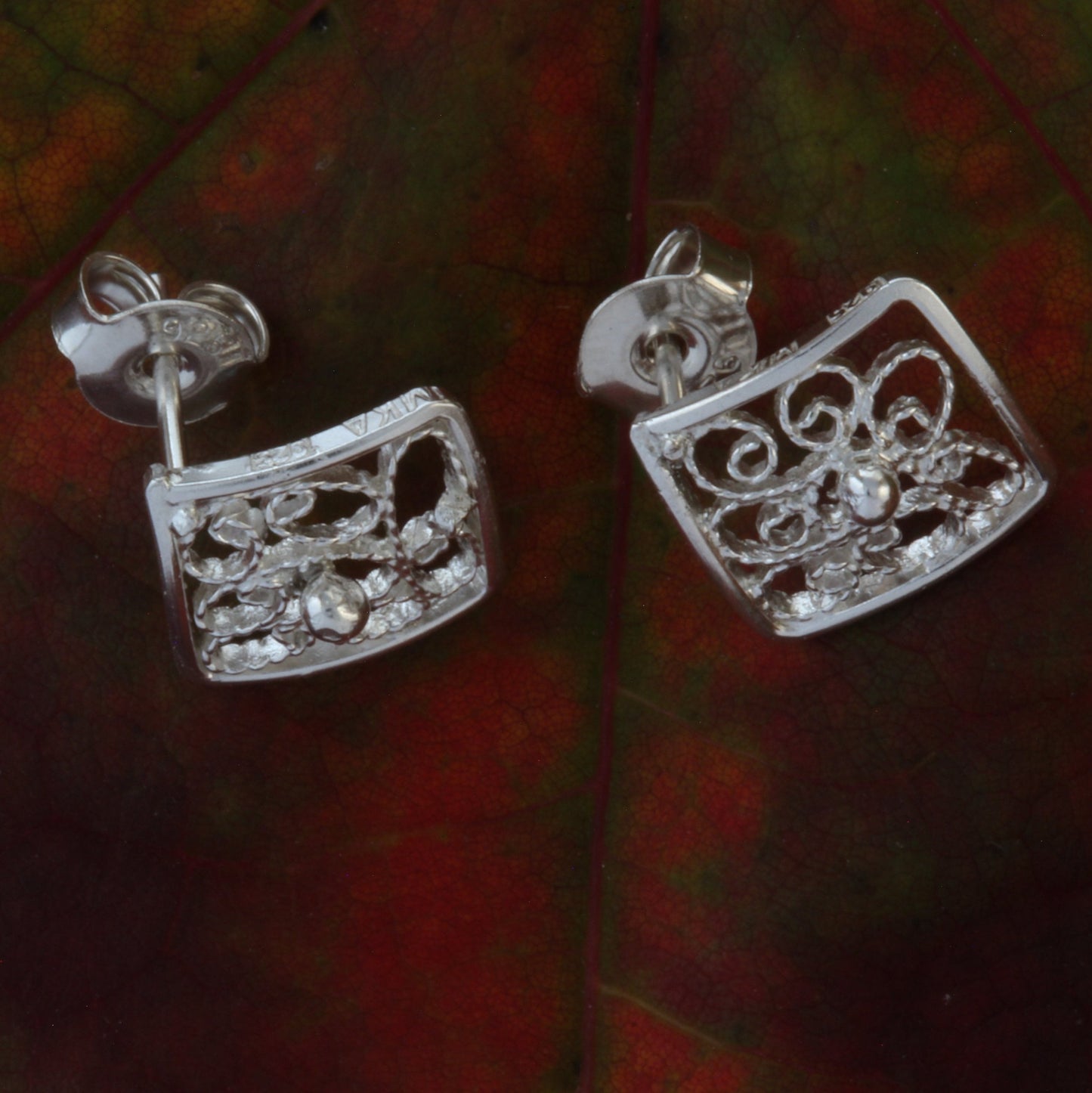 filigree silver stud earrings front