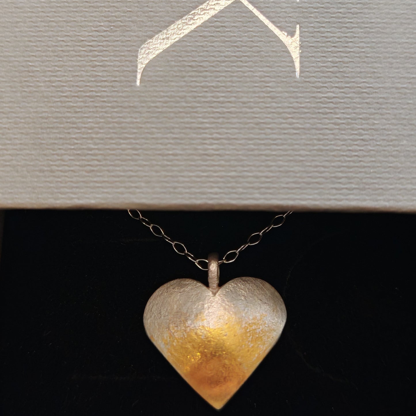 heart pendant in jewelry case