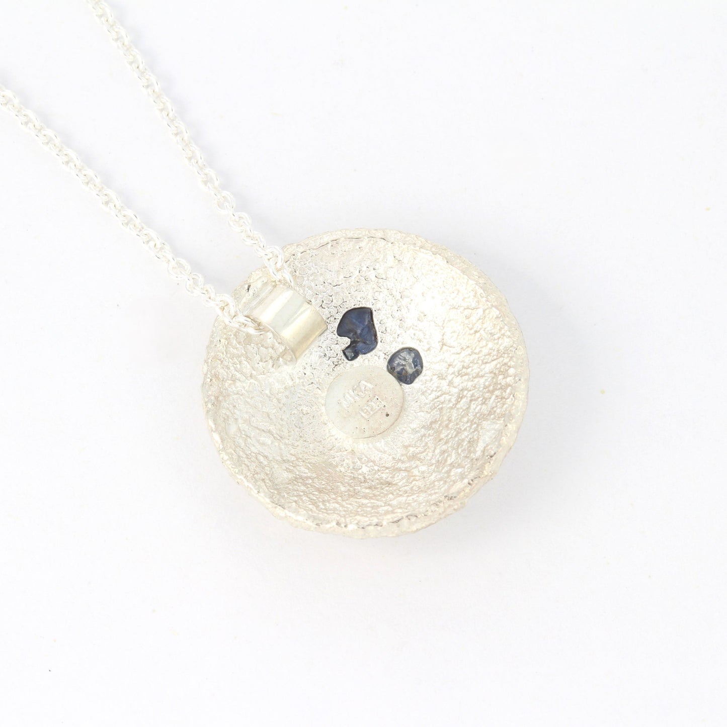 roots silver pendant with blue sapphires back