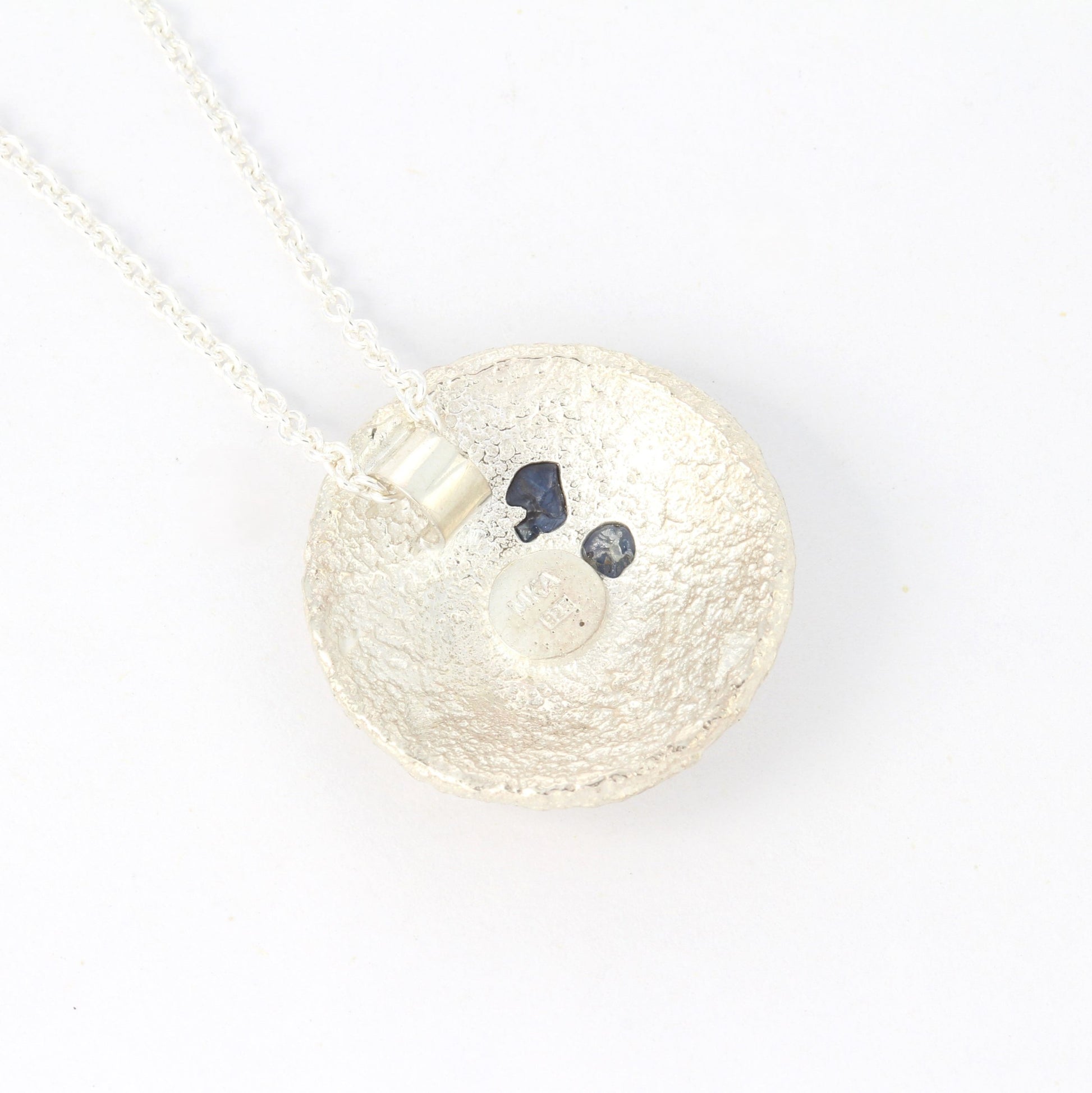 roots silver pendant with blue sapphires back