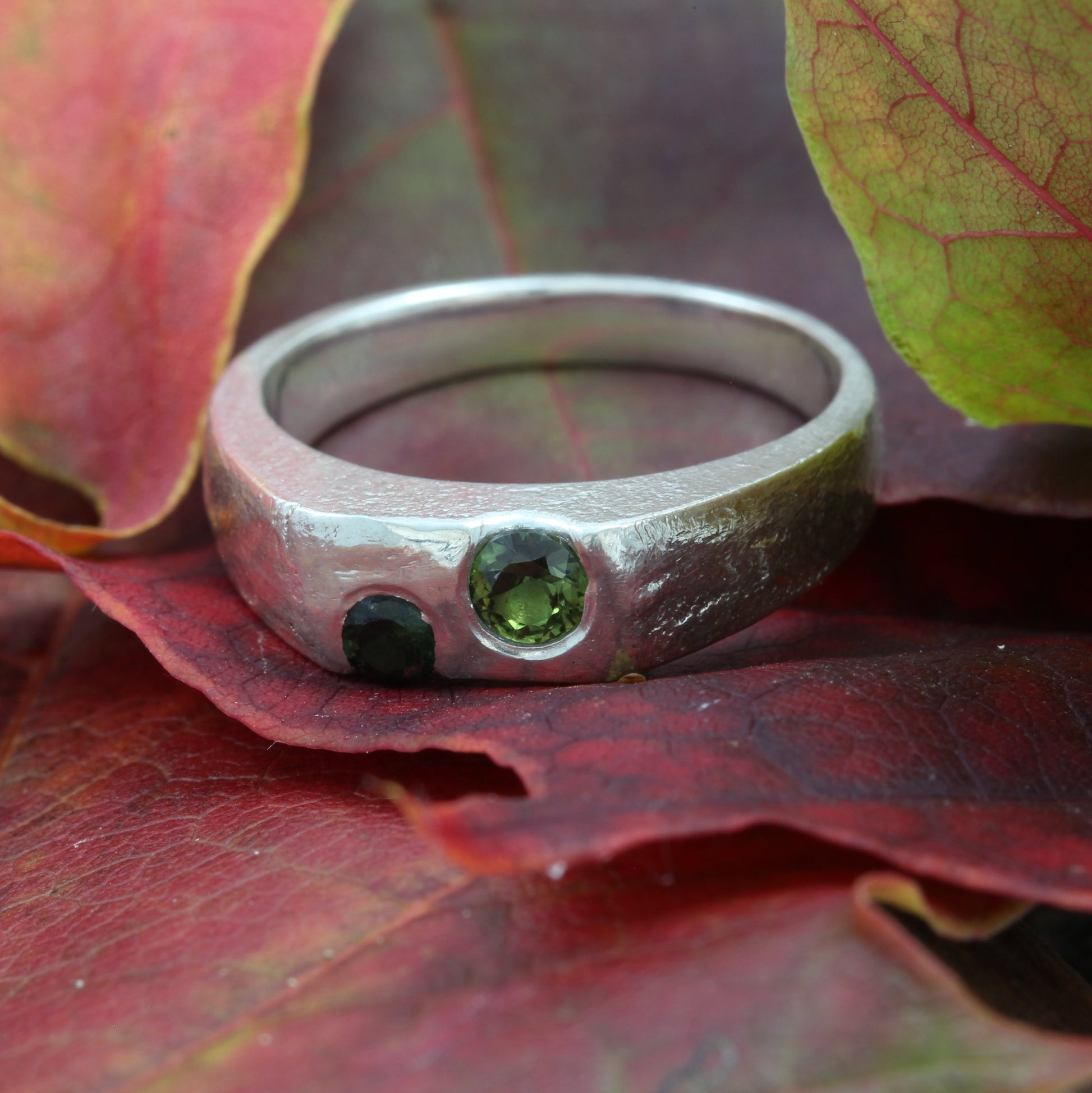 sapphire signet ring front on leaf