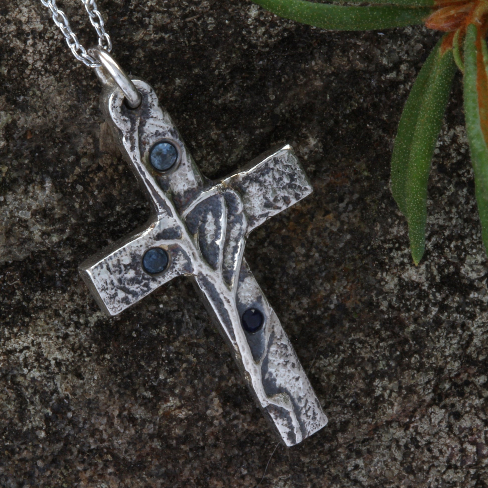 silver cross pendant with sapphires front