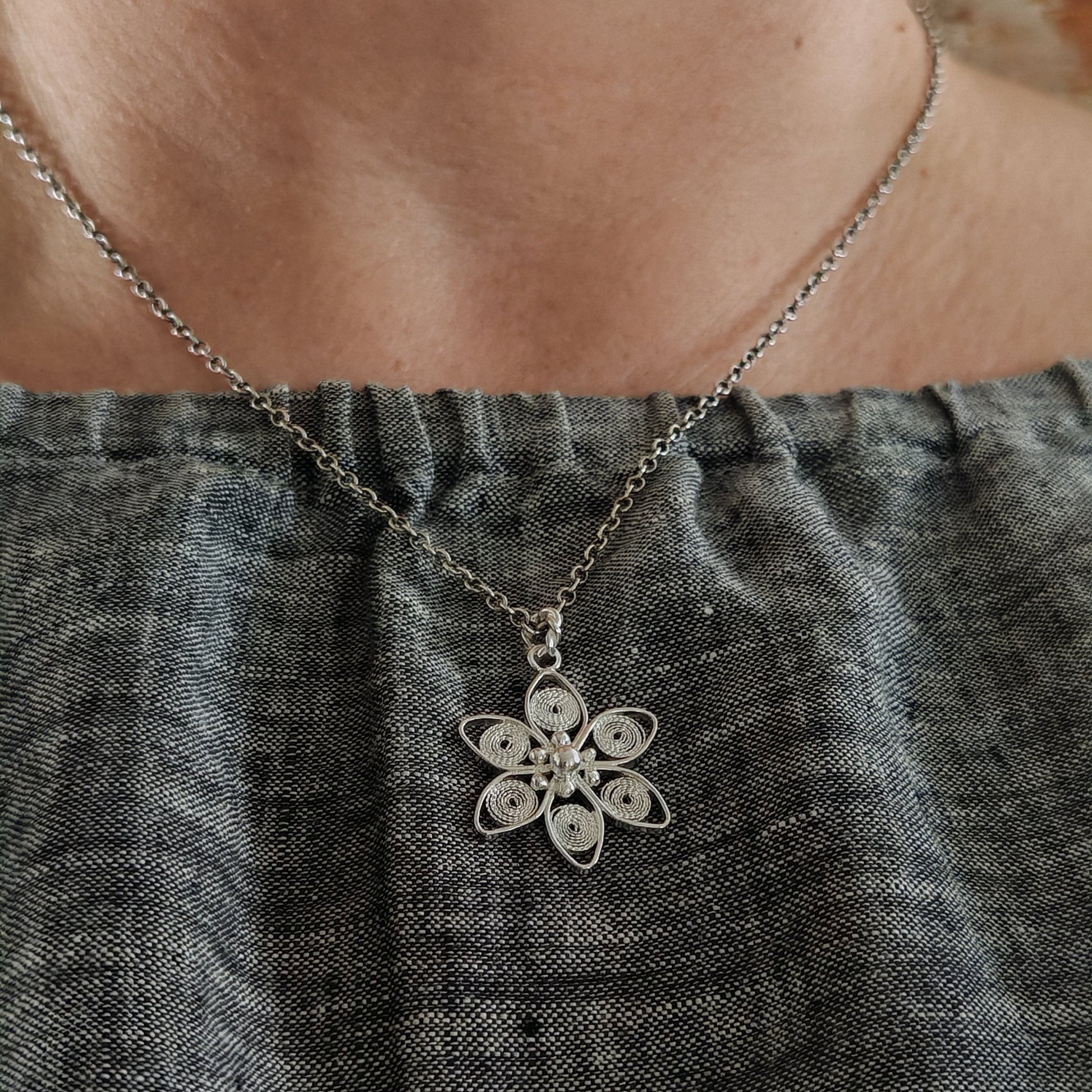 anemone nemorosa pendant on neck