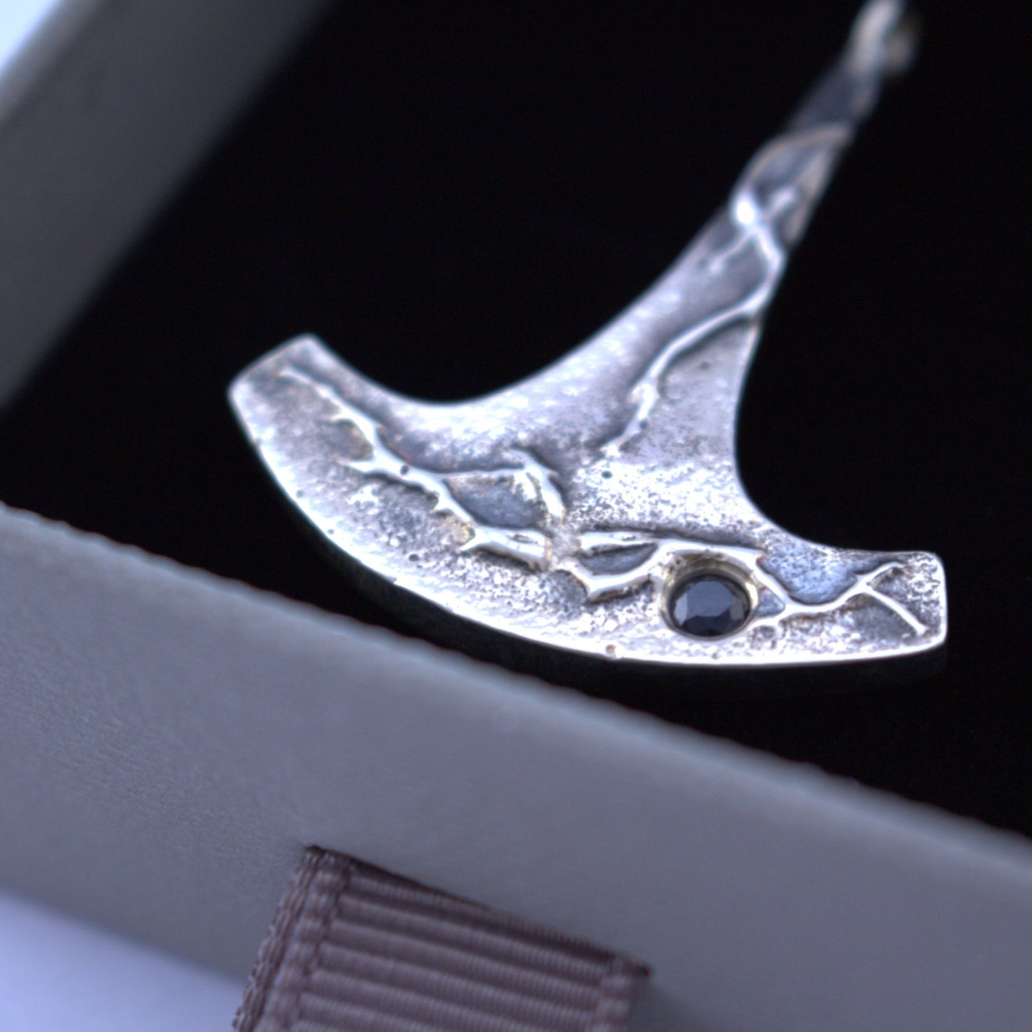 Silver Ukko's hammer pendant with sapphire